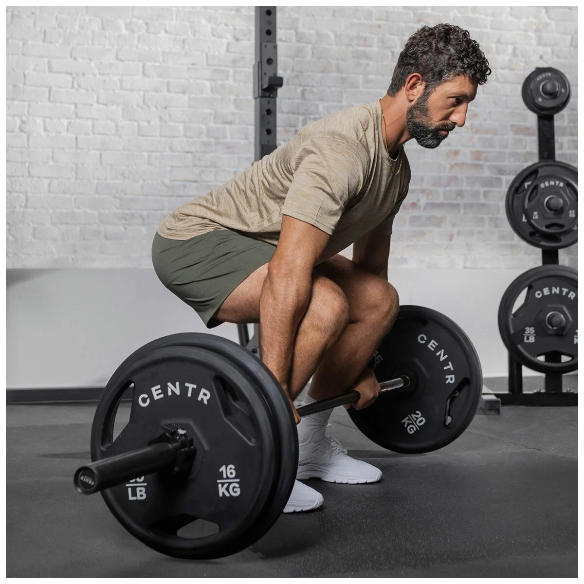 Centr 136kg Rubber Olympic Weight Set with Bar 2.13m Black Chrome Plates and Locking Collars - Image 17